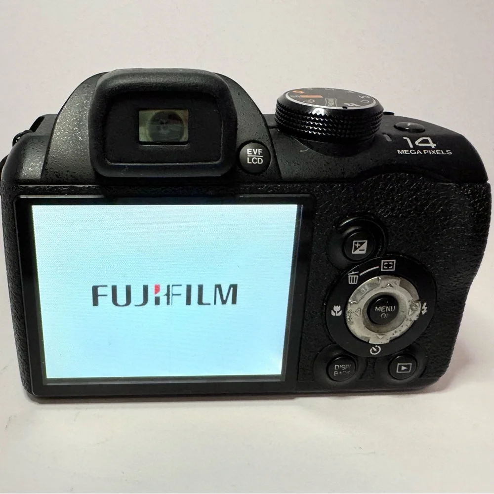 Fujifilm Black Digital Camera with Ergonomic Design and Prominent Lens